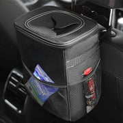 Cos de gunoi auto NextWave®️, capacitate 7,6 L, design pliabil cu capac, buzunare laterale pentru depozitare, material Oxford impermeabil cu captuseala anti-scurgere, dimensiuni 14×20×26 cm, Negru