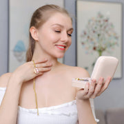 Cutie bijuterii NextWave® portabila din piele ecologica, design modern cu oglinda integrata si compartimente multifunctionale pentru inele, cercei, lantisoare si bratari, organizator compact 10 x 10 x 5 cm, roz